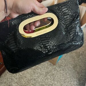 MK bag small shiny snake skin like